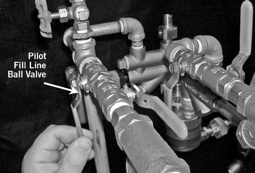 When pilot line air pressure is established, close the ball valve on the pilot fill line to the CLOSED RESTRICTED FILL position. 13.
