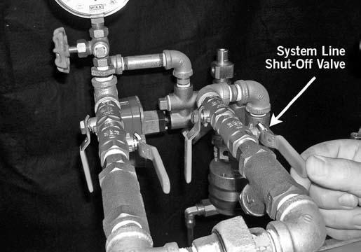 9 Bar, close the ball valve on the pilot fill line to the CLOSED RESTRICTED FILL