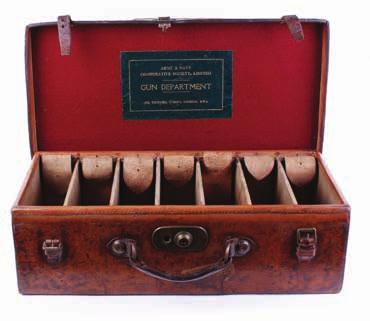 case with brass corners, red baize lined fitted interior for 26 ins barrels, Chas.