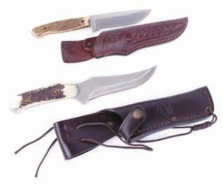Lot 456 Boker 440 knife, 4¼ ins single edged stainless steel blade, horn handle, tooled leather sheath; Puma Skinner II, 5¼ ins single edged blade, horn handle, leather sheath, boxed (2) Est 40-60
