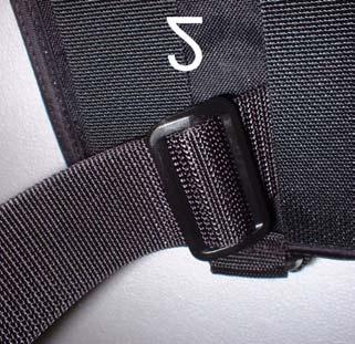 the first webbing loop sewn onto the back of the pocket.