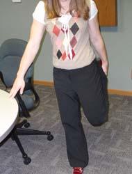 Hip flexor, Thigh and Shin Stretch For better balance, place one hand on your desk.
