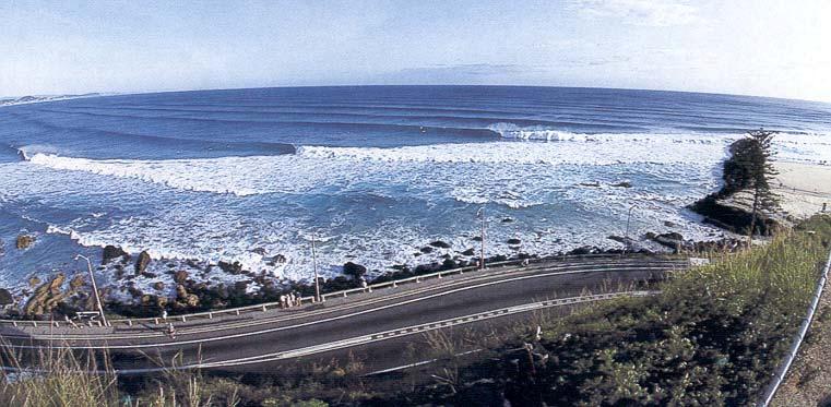 Figure 2: Waves refracting around the Kirra Point groyne, Gold Coast, Australia producing a surfing break (Source: TRACKS MAGAZINE, 2000).
