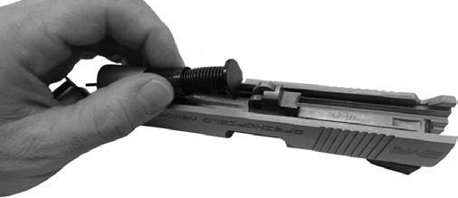 Firmly snap the takedown piece over the exposed portion of the guide rod between inner spring plug and guide rod cap. (See fig. 43-2) 3.