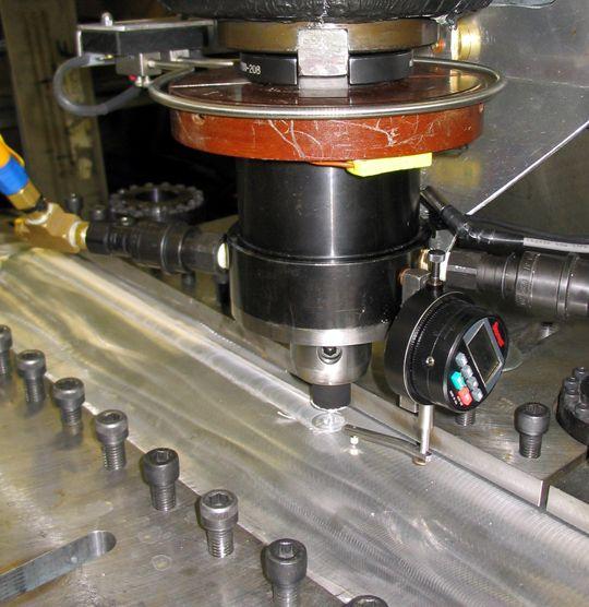 A liquid-cooled tool holder was used to minimize heat flow into the machine head.