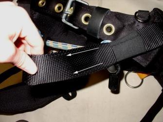 4) Unthread the Suspension Bridge Adjustment Strap through the Spring Loaded Friction Buckle (Figure 5).