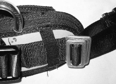 (Figure 4) 2) Angle the smaller of the two Waist Strap Adjustment Buckles and insert it through the backside of the larger Waist Strap Adjustment Buckle (Figure 5).