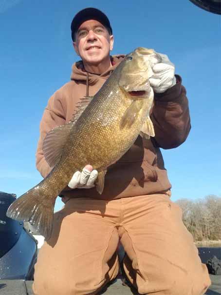 John Henry with a trophy smallmouth caught