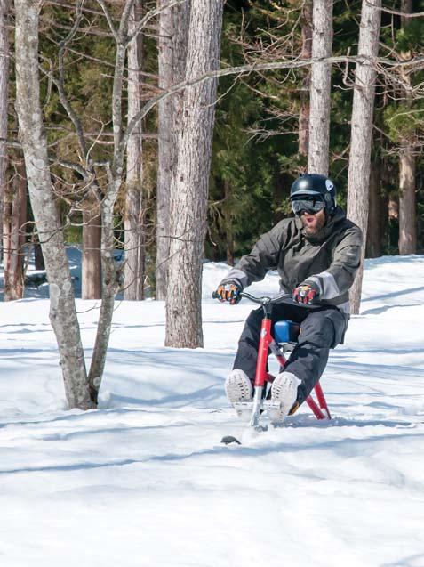 discover fun Snow Bike trails through the forest. Complimentary helmet use.