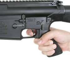 The bolt should remain to the rear against the bolt stop. Remove the magazine. Press in on the bolt stop (L-13). The bolt carrier assembly should be propelled forward by the operating spring. 3.