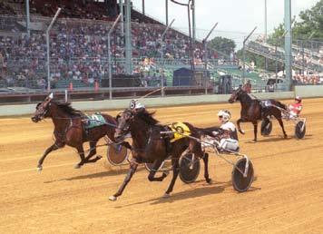 Du Quoin State Fair Each year the Du Quoin State Fair in Du Quoin, Ill. hosts some of the biggest races on the Grand Circuit, including the World Trotting Derby.