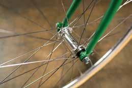 and loosen the nuts on the hub of the front wheel.