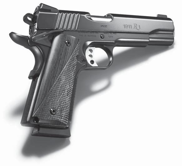 SEMI-AUTO PISTOLS fired. Or it can be manually returned forward. An LH9C (compact) and LH9R (rail) are also now being offered. (www.lionheartindustries.