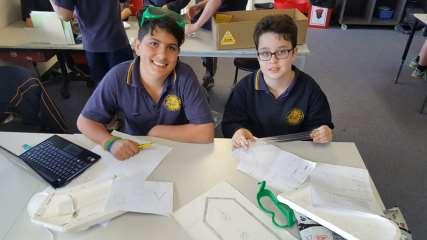 With the guidance of Tony Uniacke, the class are using his expertise to shape their boats into streamlined