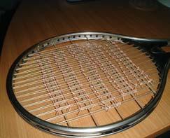 ( 6 ), ( 7 ) 4 lbs 7 lbs ( 7 ) 6. 13 X K G K B K GB K G 14 ( 8 ) - ( 12 ) 15 2 m/s ( 2 ), ( 3 ) 7. (a) Illustration of a 'Spaghetti' strung racket. (b) Picture of a 'Spaghetti' strung racket. (c) Fig.