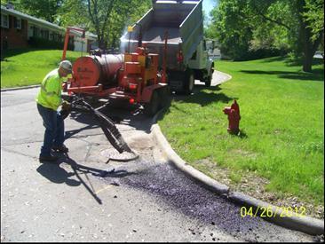 Page 4 of 8 Street Pothole Repairs Public Works employees are repairing potholes in streets. The asphalt patching machine purchased in 2010 has seen a lot of use during the past few years.