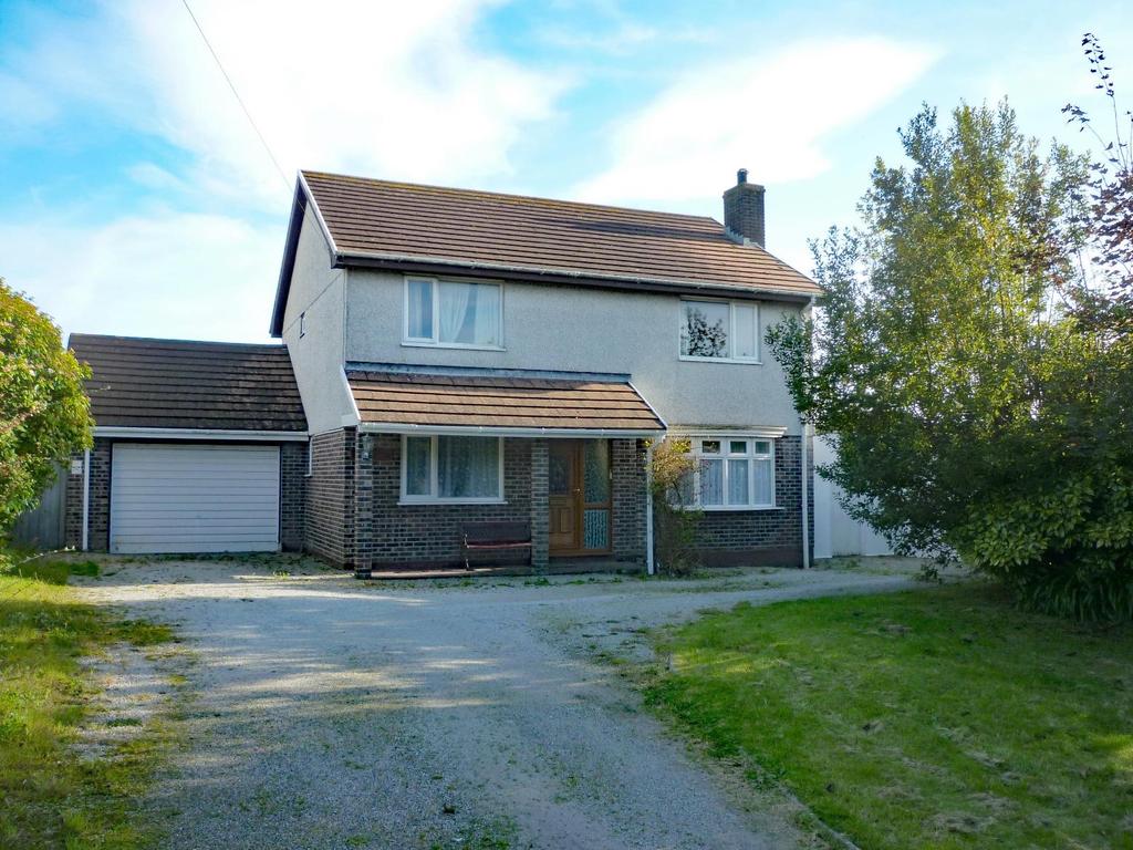 REF: 9138 Guide Price 349,500 WOODLANDS PERRANWELL ROAD, GOONHAVERN, TRURO TR4 9JN Conveniently situated, spacious 4-5 bedroom detached house with double garage and store room.
