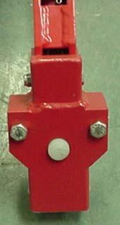 Anti-clockwise rotation of the Cable Adjustment Nut allows the Locking Jaws to project further out of the Housing. d.