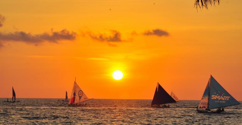 Sunset paraw sailing Feel the wind and the waves in a traditional Filipino style sailboat.