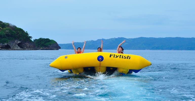 Fly Fish This is an exciting ride you are pulled along by a speedboat while riding a huge inflatable fish!