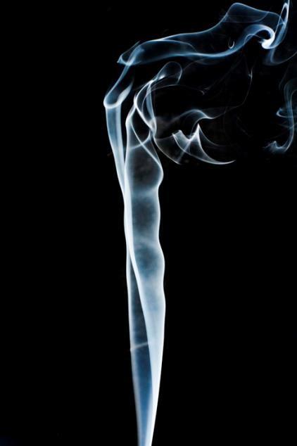 Smoke rises smoothly for a while and then begins to form swirls and eddies. The smooth flow is called laminar flow, whereas the swirls and eddies typify turbulent flow.