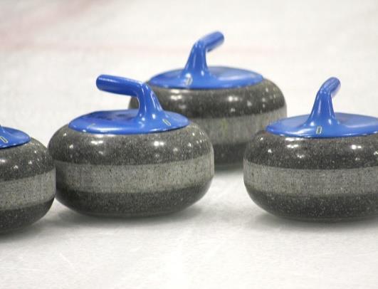 Curling is a team sport that is played on ice. Players wear special shoes that grip the ice so they do not slip. They slide a stone toward a circular target.