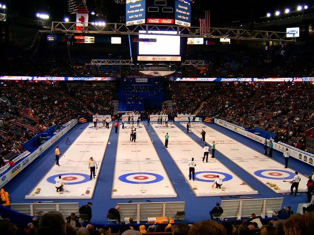 Teams take turns sliding their stones made of heavy granite across the ice towards the target. Curling stones are generally about 40 pounds so they are not easy to slide!