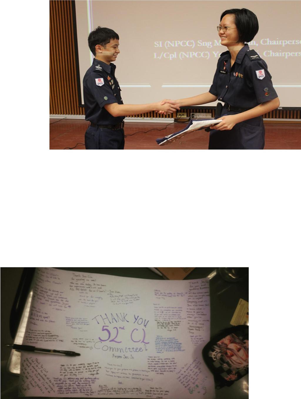 Chairperson of the 52nd CL Committee, SI (NPCC) Sng Ming Xian, passing the NPCC flag to the Chairperson of the 53rd CL Committee, L/Cpl (NPCC) Yeo Wei Ni.