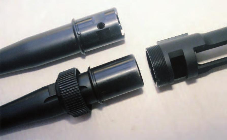 RIGHT: Barrel extensions slide into the receiver ring and are indexed by a steel pin engaging a notch in the front of the receiver.