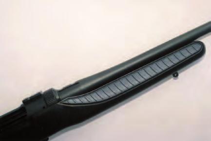 RIGHT: The forend is contoured and the free-floated barrel sits above it to allow space for fitting a heavy varmint weight barrel. SPECS T/C Dimension Maker: Thompson/ Center Arms, 866-730-1614,www.
