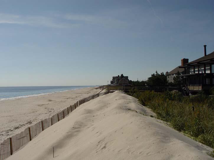 The municipality has a policy of requiring oceanfront owners to contract to have sand pushed up from the berm to restore the dune s width and slope following these erosional episodes. 1117 OCEAN AVE.