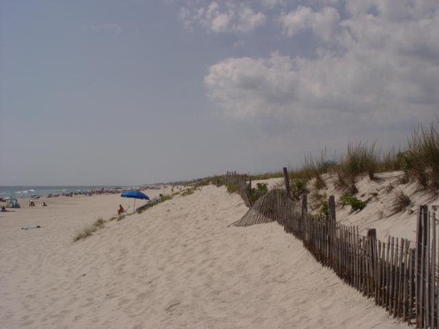 The beach can be seen as considerably wider in this August 29, 2007 photograph to the right. The berm was 40 to 50 feet wider as of the May 3, 2007 survey. The 18-month comparison saw 46.