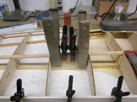 Back to the starboard wing, the top spar has been glued in place as well as a piece of 1/4 balsa