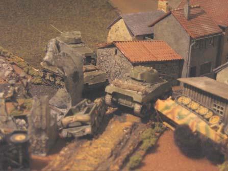 The final Jagdpanzer, disorderd by Firefly fire, gives up the fight and trundles off to the south.