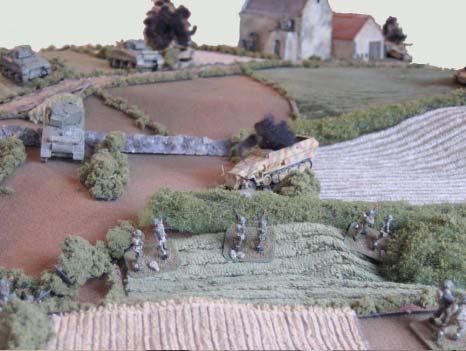 Meanwhile, the British commander, suspecting that the enemy may be using the high ground to the south as an observation point, sends C Co. on a long flanking maneuver to the right.