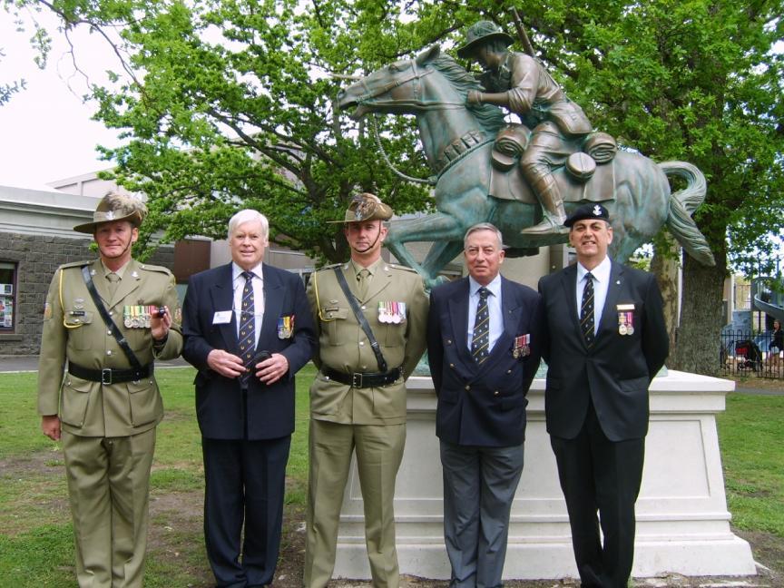 At the unveiling of the Light Horse Statue at Kyneton, former members of the 4th/19th Prince of Wales Light Horse gather with key-note speaker and former Air Force officer Mike Garnett.