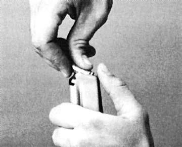 PREPARING TO FIRE - LOADING THE MAGAZINE Preparing the handgun for firing is composed of three basic steps: Loading the magazine, Inserting the magazine, and Loading the Handgun Chamber.