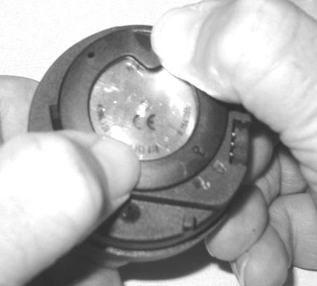 While tightening the Retaining Ring, exert continuous inward pressure on it until it is secured in the proper position.