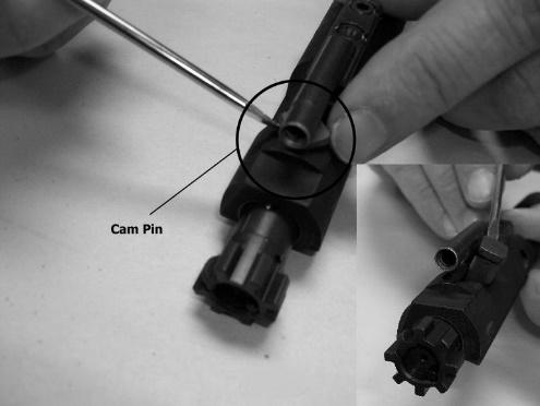 Figure 12c. Remove cam pin Figure 12d. Extractor and ejector orientation Cleaning your Firearm Once the FR-15 rifle is field stripped, it can be properly cleaned.