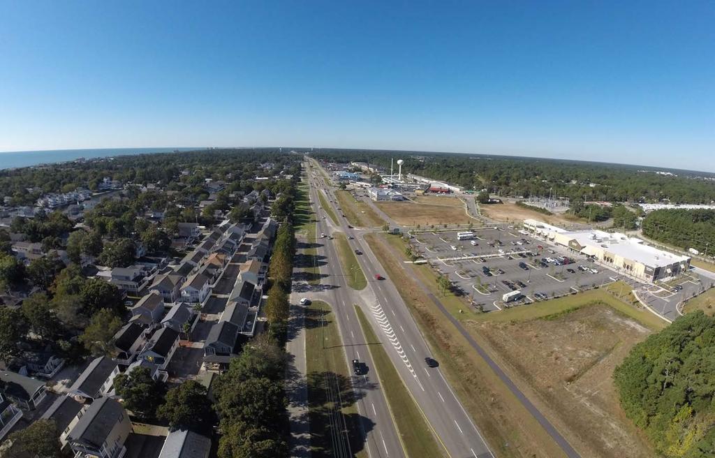 SITE AERIAL > SOUTH VIEW Ocean Lakes Family Campground Parcel B Vogue Nail & Spa All in