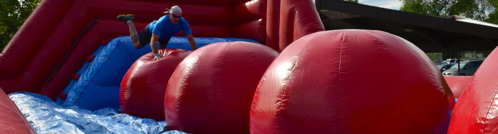 You can purchase passes at our registration tent to get your bounce on in the Inflatable Village!