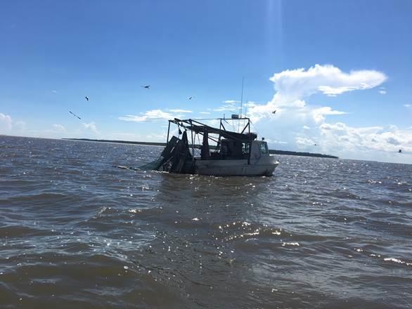 As a part of the patrol the Game Wardens boarded a small shrimp trawler near St. Catherine Sound. The boarding included checks of the appropriate licenses and fishing gear.