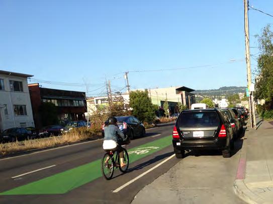 27B) Bicycle May Use Full Lane (R4-11) signs 5 Foot experimental green band centered in #2 travel lane with sharrows