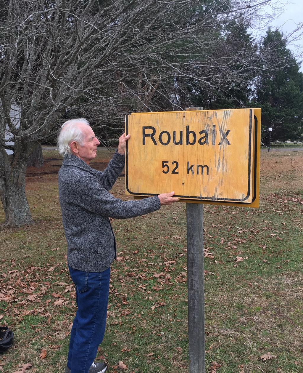 The reproduced antique Belgian highway sign is planted in the front of WAB Past President Bob Austin s home on Ware Creek.