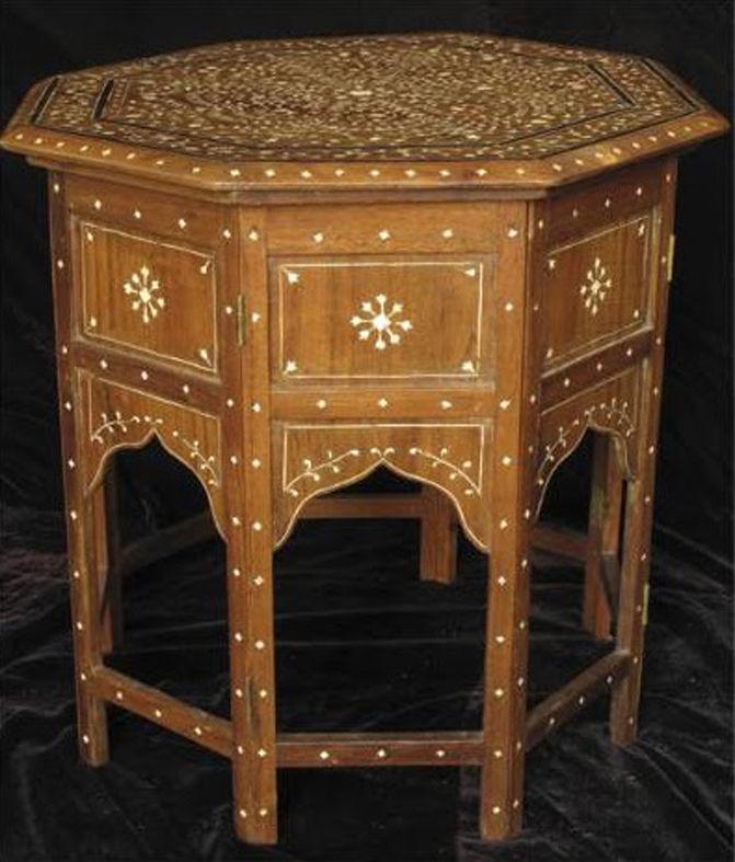 Furniture, which may be made of rosewood or include ivory inlay. Ivory billiard balls.