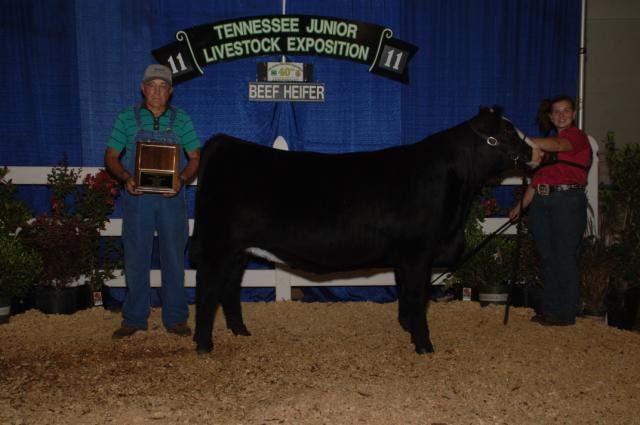 Other Breeds (Animals Shown: 27, Bred by Exhibitor: 3): Grand Champion: 215, Madison Martin,