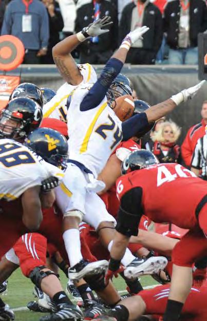 CINCINNATI, OHIO - (Nov. 12, 2011) - West Virginia earned a road victory over a ranked opponent the hard way with a thrilling 24-21 win over Cincinnati in Paul Brown Stadium.