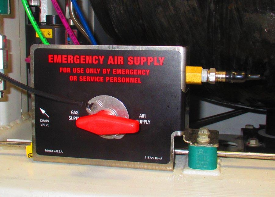 If the air hose is pressurized, and the master control switches are ON, switching the emergency air supply switch from gas supply to air supply may activate the cylinder valves and initiate gas flow.