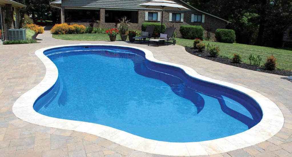 THE FANTASY + Beautiful, free-flowing design provides softness of curvature without the loss of swim space + Design allows for numerous landscaping options + Built-in fun pad
