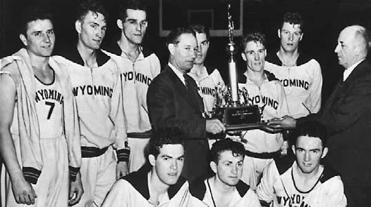 154 ALL-TIME TOURNAMENT FIELD TEAM CHAMPIONS 1943 CHAMPIONSHIP GAME, March 30 at New York.................................... WYOMING 46, GEORGETOWN 34 1943 Wyoming Front Row (left to right): Don Waite, Earl Ray and Jim Reese.